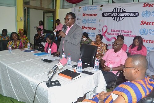 Mr Martin Adu-Owusu (middle) speaking at the programme. With him are Ms Dakoa Newman (left) and other dignitaries Photo Victor A. Buxton